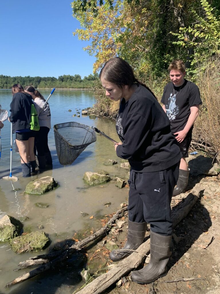 Bryan students on a field trip at a lake